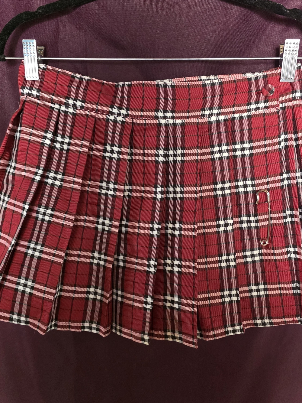 Spirit Halloween red, white and black plaid mini skirt with oversize safety pin